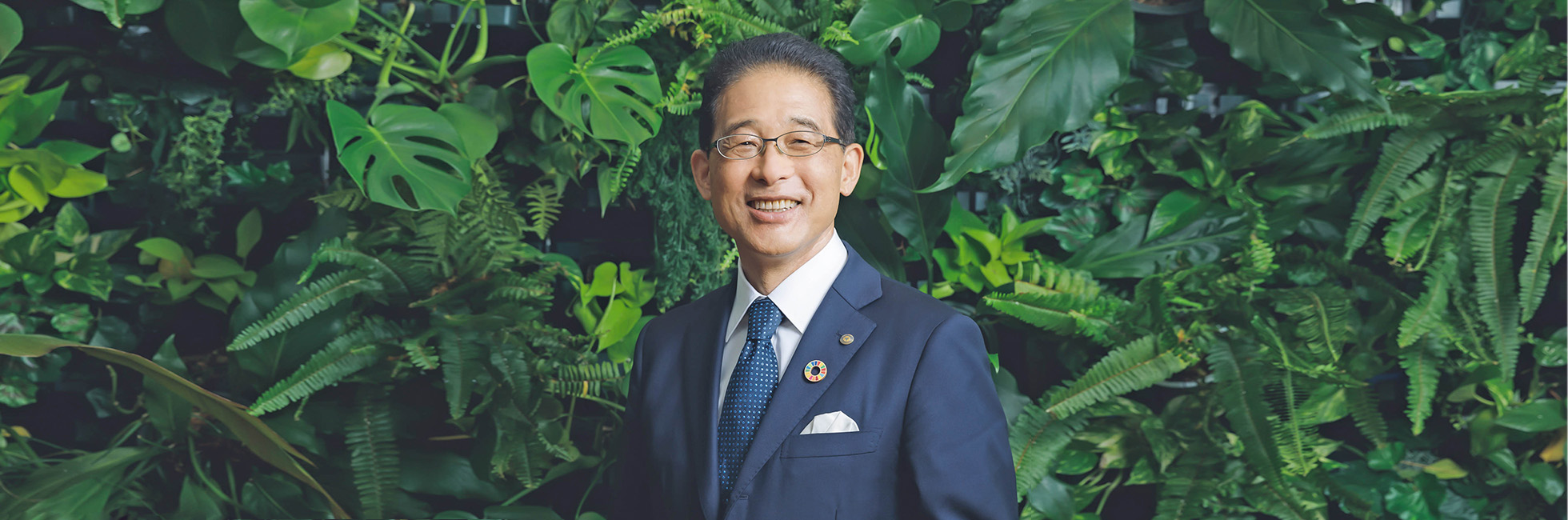 Yuji Okuma, President & CEO